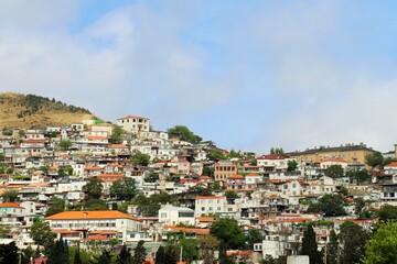 Fototapeta na wymiar Residential buildings on a steep mountainside