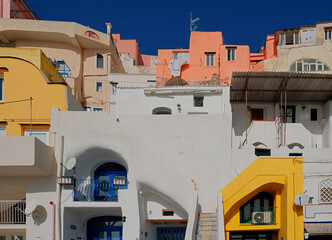 Colorful building architecture at Marina Corricella, Procida Island, fishing village at the Mediterranean sea, Bay of Naples, Italy