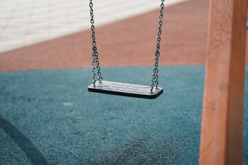Children's swing on a chain