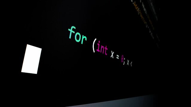 Closeup macro shot movement of coding script moving across LED screen with real-time AI-generated typing, showcasing advanced AI learning in optimization, debug and coding for software development.