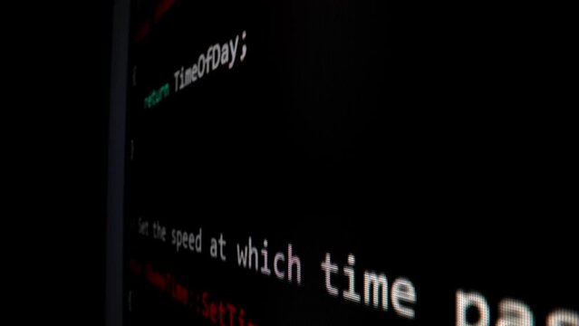 Closeup macro shot movement of coding script moving across LED screen with real-time AI-generated typing, showcasing advanced AI learning in optimization, debug and coding for software development.