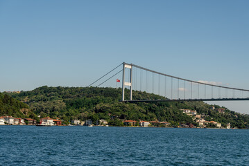 Fatih Sultan Mehmet Bridge and Turkish Flag on the Bosphorus. Istanbul, Turkey. (Fatih Korosu, Fatih Sultan Mehmet Köprüsü)
