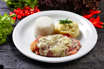 The steak parmigiana with potato