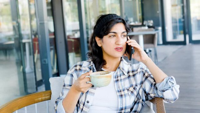 modern woman talking on cell phone