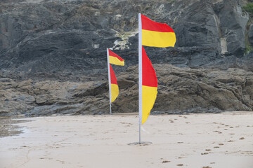 Life guard flags on the beach