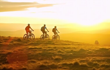 Fototapeta na wymiar Cyclists in the mountains at sunset. Sport and active life concept