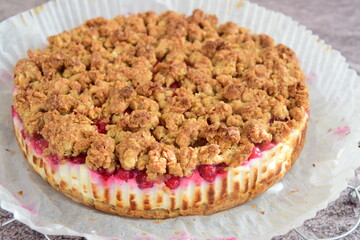 Homemade red currant cheesecake crumble