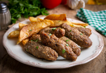 Traditional Turkish food; dry meatballs or inegöl meatballs with potatoes (Turkish name; Kuru kofte or anne koftesi)