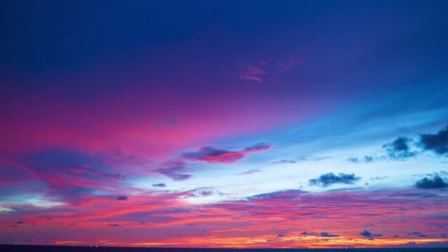 Aerial hyperlapse colorful pink cloud in the blue sunset..Unconventional and beautiful natural views of the sky..Nature video High quality footage..Unique and creative travel and nature idea videos