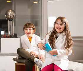 Elementary school children doing experiments in the laboratory
