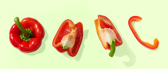 Red pepper on green pastel background
