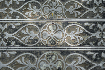 Old decorative metal anti-slip steps, top view.