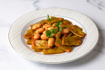 Traditional delicious Turkish food; Green beans with olive oil; Turkish name; Zeytinyagli taze fasulye