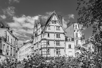 Angers, Loire Valley area, France: Adam's House, house of artisans; timber-framed house in Sainte Croix Square in black and white - 618641923