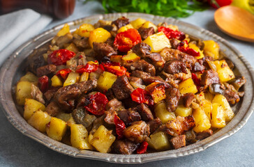 From Turkish cuisine; meat, vegetable kebab, casserole. Turkish name; Maras Tava or Kahramanmaras Tava - Orman Kebabi