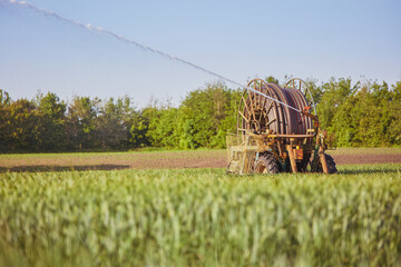 Old mobile machine for irrigation of fields in Denmark