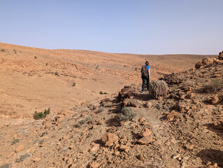 Hiking through the stone desert near Amtoudi in the Anti-Atlas