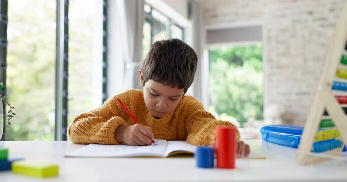 Home learning, math education or boy in kindergarten studying for knowledge or growth development. Focus, assessment or smart child writing or counting on numbers to study for test in notebook alone