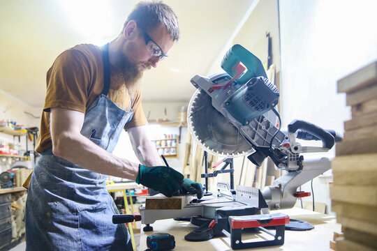 handsome skilful woodworker