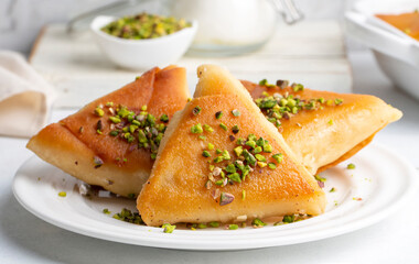 Traditional Turkish desserts; custard triangular dessert, albanian dessert ( Turkish name; Arnavut tatlisi or muhallebili muska tatlisi)