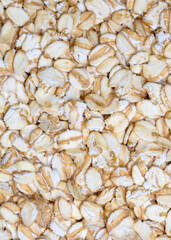 Heap of dry rolled oats isolated