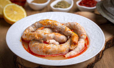 Traditional delicious Turkish cuisine, Middle Eastern dishes, offal dishes, stuffed sheep intestines (Turkish name; Mumbar dolmasi)