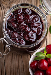 Jars with freshly homemade cherry jam, sour cherry jam, Turkish name; Visne receli