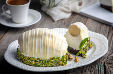 Banana cake with white chocolate on a white background. Fruity malaga cake. close up