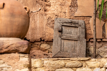 Beautiful old window shutter leaning at a facadeof a house in Agadir