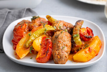 Traditional Homemade Turkish Food Kofte - Kofta with Tomato Sauce and Potatoes. (Turkish name; Izmir kofte)