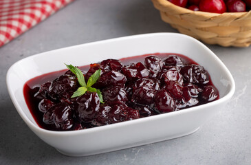 Jars with freshly homemade cherry jam, sour cherry jam, Turkish name; Visne receli