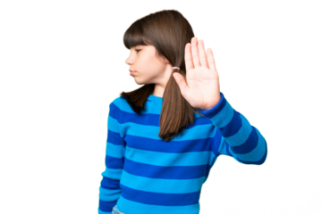 Little caucasian girl over isolated background making stop gesture and disappointed