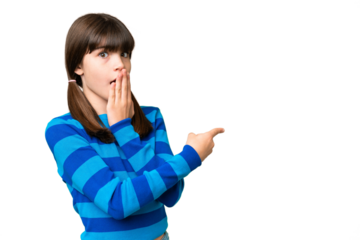 Little caucasian girl over isolated background with surprise expression while pointing side