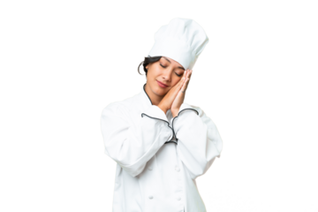 Young chef Argentinian woman over isolated background making sleep gesture in dorable expression