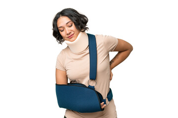 Young argentinian woman wearing neck brace and sling over isolated background suffering from...