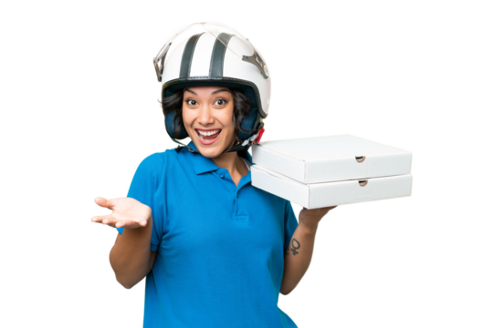 Pizza delivery Argentinian woman with work uniform picking up pizza boxes over isolated background with shocked facial expression