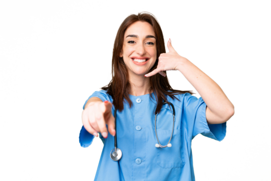 Young nurse woman over isolated chroma key background making phone gesture and pointing front
