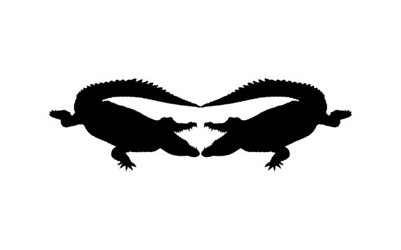 Pair of the Crocodile or Alligator Silhouette for Art Illustration, Pictogram, Logo Type, Website or Graphic Design Element. Vector Illustration