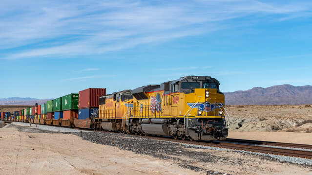 Palm Springs, USA  - January 22 2018 : Union Pacific Cargo train passing by the desert in Palm Springs.