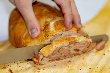 Traditional pepperoni sausage bread with homemade handmade dough. Rustic bread, real food.