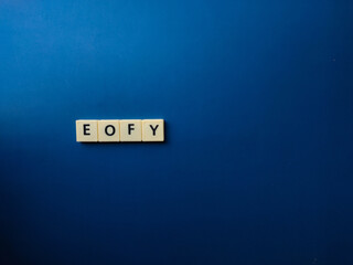 Top view toys letters with the word EOFY