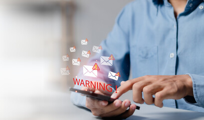 Email spam virus warning, businessman reading electronic mail with smartphone. Spam, junk mail,...