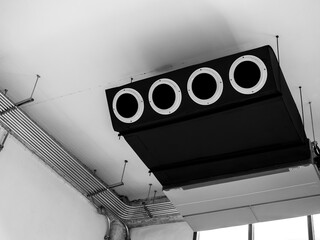 Black machine, modern air conditioning ceiling mounted ventilation system decoration on ceiling...