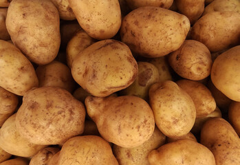 Piles of potatoes in a traditional market