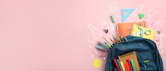 School backpack with stationery on pink background with space for text, top view © Pixel-Shot