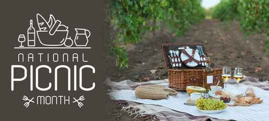 Banner for National Picnic Month with tasty food and wine on plaid in vineyard