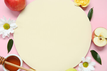 Composition with blank card, ripe fruits, flowers and honey on pink background, closeup. Rosh hashanah (Jewish New Year) celebration