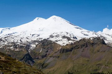 View of Elbrus from Cheget on a sunny June day. Kabardino-Balkaria, Russia