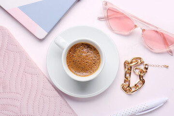 Cup of hot espresso and accessories on white background