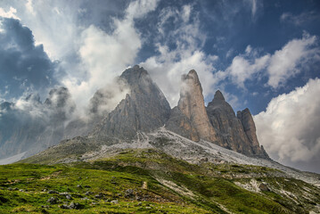Fototapeta na wymiar Floating clouds around the Tre Cime di Lavaredo peaks in the Italian Dolomites 